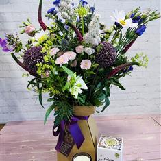 Flora Lab candle and flowers